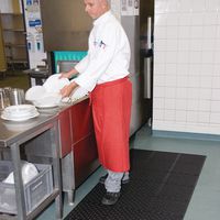 Tapis antidérapant réversible et perforé pour le drainage - Notrax